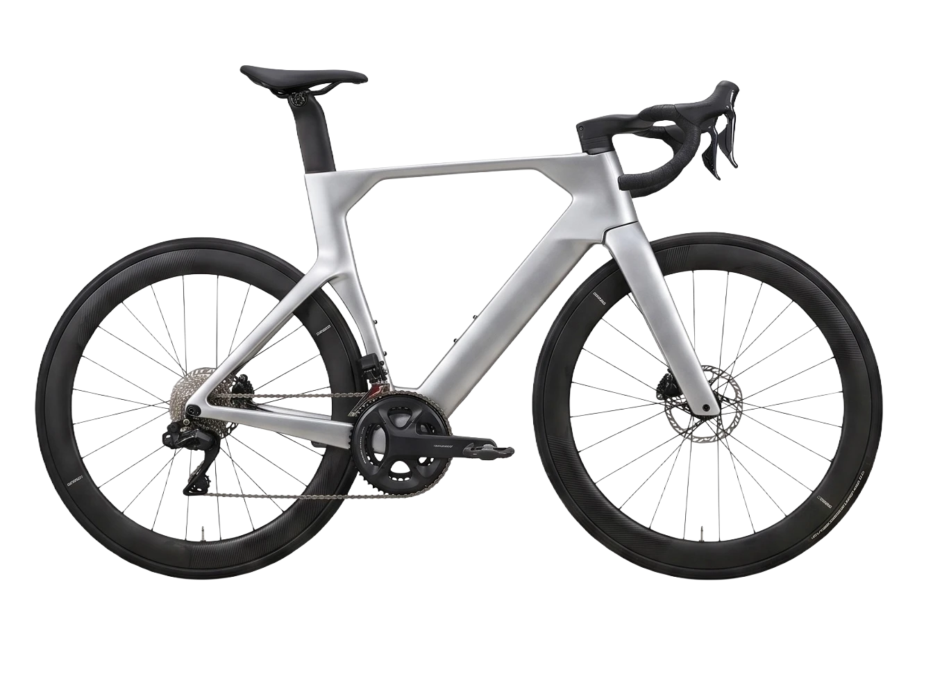 The Prisma One aero road bike in full side profile — silver carbon-fibre frame on deep-section black carbon wheels.
